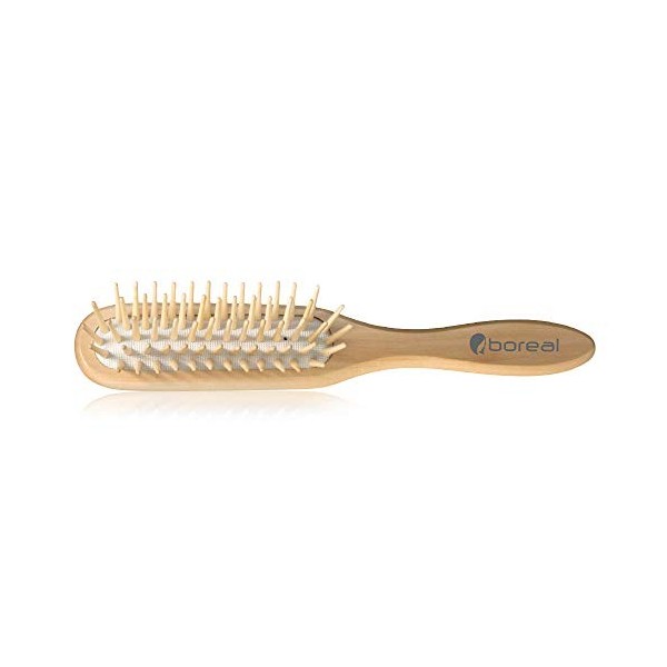 Brosse cheveux, pneumatique et antistatique. Structure et pics entièrement en bois naturel.