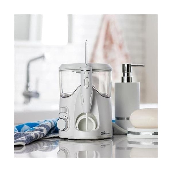 Waterpik WF-06UK - Hydropulseur professionnel avec pastilles de blanchiment des dents à la menthe - Outil de retrait de la pl