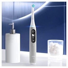Oral-B iO 6 brosse à dents électrique, 1 poignée grise rechargeable, 1 tête de rechange, 1 étui de voyage, écran noir et blan