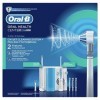 Oral-B PRO 900 Brosse à dents électrique rechargeable + irrigateur avec technologie Oxyjet de Braun, 4 têtes de rechange Oxyj