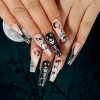 SINLOV Lot de 24 faux ongles dHalloween à couverture complète - Noir foncé - Squelette humain - Citrouille - Faux ongles lon