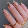 JUSTOTRY Lot de 24 faux ongles ovales en forme damande de Noël - Avec motif neige - Doré - Pour femme