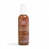 The Body Shop Coconut Bronze Lotion bronzante graduelle pour peaux sensibles, légère et non collante