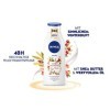 NIVEA Winter Moment Lait corporel 400 ml , lotion pour le corps riche pour peaux sèches, soin hivernal en profondeur, hydrat