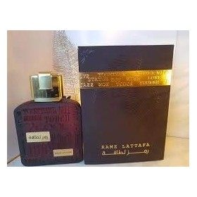 LATTAFA Ramz Lattafa Gold Eau de Parfum 100 ml Unisexe Notes de parfum : Fruité, Bois, Ambre et Vanille Noix de parfum