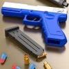 Pistolet Jouet, Glock de Simulation, Pistolet pour Enfants avec 2 chargeurs et 30 balles, éjection Automatique des balles, Je