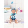 BABY born 4001167832325 First Swim Boy Boy-30cm Doll with Fixed Costume and Hat-Wind Action-Can go in The Bath Or Pool-Suitab
