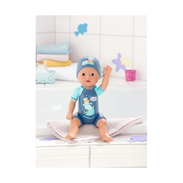 BABY born 4001167832325 First Swim Boy Boy-30cm Doll with Fixed Costume and Hat-Wind Action-Can go in The Bath Or Pool-Suitab