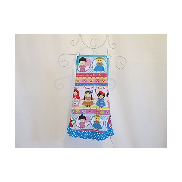 Tablier fille à froufrou en tissu poupée du monde 3-6/8 ans