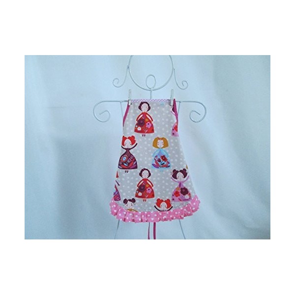 Tablier fille à froufrou en tissu beige avec des poupées multicolores 4/6 ans