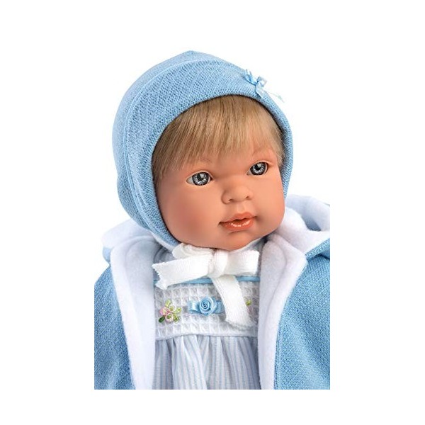 Poupée Miguel avec Yeux Bleus et Cheveux blonds, poupée bébé avec Corps Souple, Tenue Bleue, 42 cm