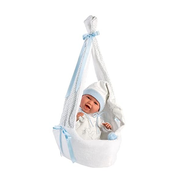 Llorens 1074005 Poupée de bébé avec Yeux et Corps Doux et Tenue Bleue avec Bonnet à Pointe, tétine, Attache-tétine et Berceau