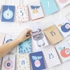 Julica Calendrier de lAvent design pour bébé | 24 surprises pour parents et bébé + cordon décoratif à suspendre | Recommandé