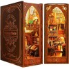 Book Nook DIY Noël Maison de poupées en Bois Kit Maison Miniature avec boîte à Musique et Cache-poussière, Jour de Noël 3D Pu