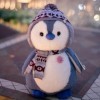 EacTEL Mignon pingouin en peluche avec chapeau Kawaii Pingouin Poupée en peluche Fille Décoration dintérieur 47 cm 3