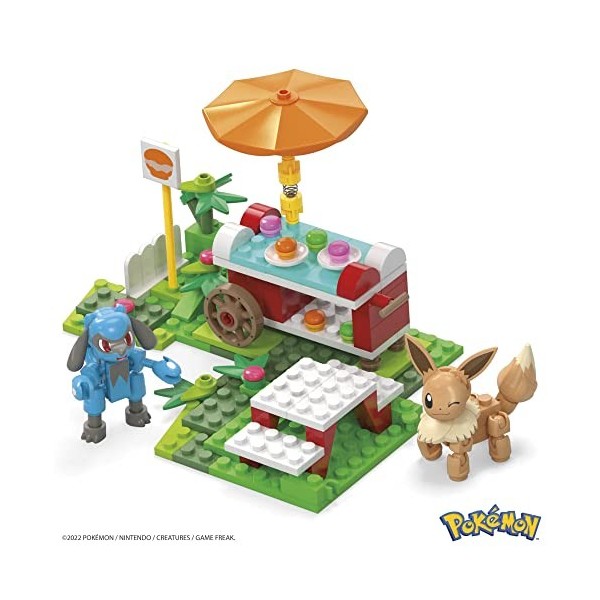 MEGA Pokémon Coffret de construction Pique-Nique pour Figurines Évoli et Lucario avec 193 briques et pièces compatibles, Joue