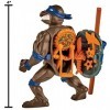 Teenage Mutant Ninja Turtles Figurine de Tortue Donatello Classique avec Coque de Rangement