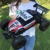 BONOCO 1/16 Tout-Terrain Choc Rechargeable Double Moteur Voiture de Course véhicule Tout-Terrain électrique Camion descalade