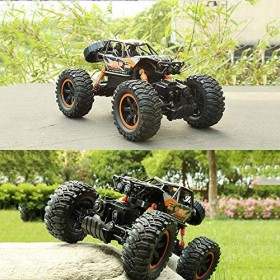 XiYou Voitures télécommandées Course à Grande Vitesse Véhicule Tout-Terrain 1:14 Radio 2.4Ghz Camion Monster 4WD avec Deux Ba