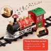 THE TWIDDLERS 15 Pièces Train de Noël Électrique avec Rails, Lumières, Sons & Accessoires - avec Boîte-Cadeau - Déco de Table